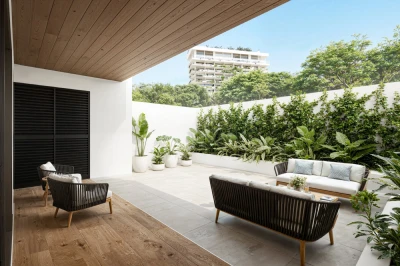 Illustrative rendering of the furnished patio with seating and tropical landscaping